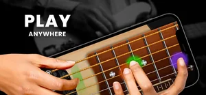 Playing chords on the on-screen guitar fretboard held in landscape